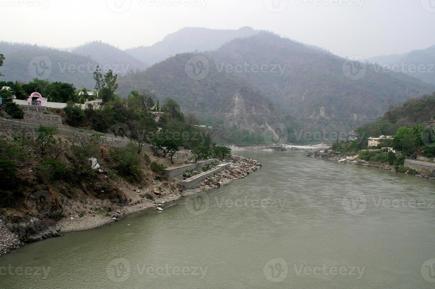 After flowing through the mountainous region, river photo