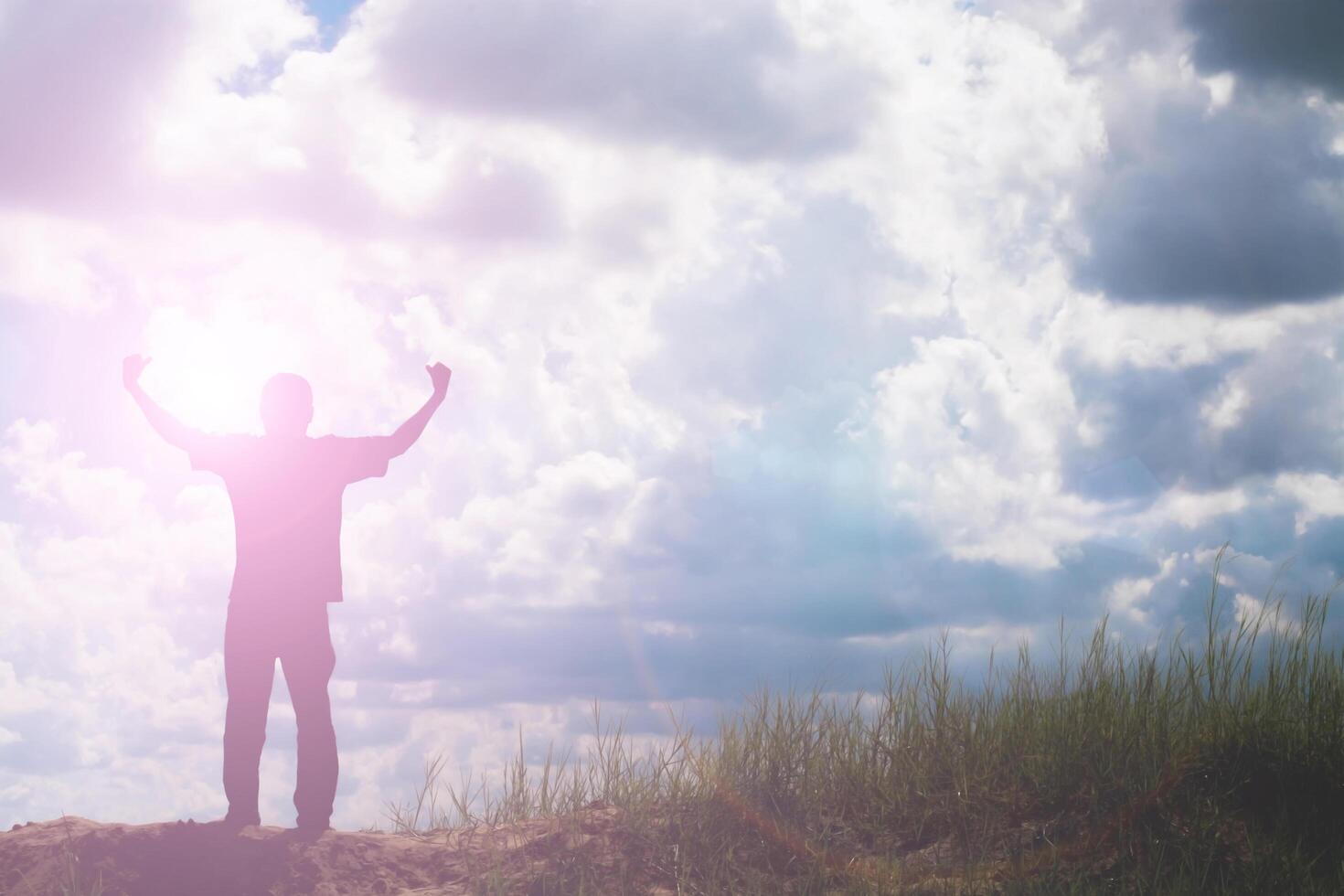 Silhouette man show his muscle, life strong photo