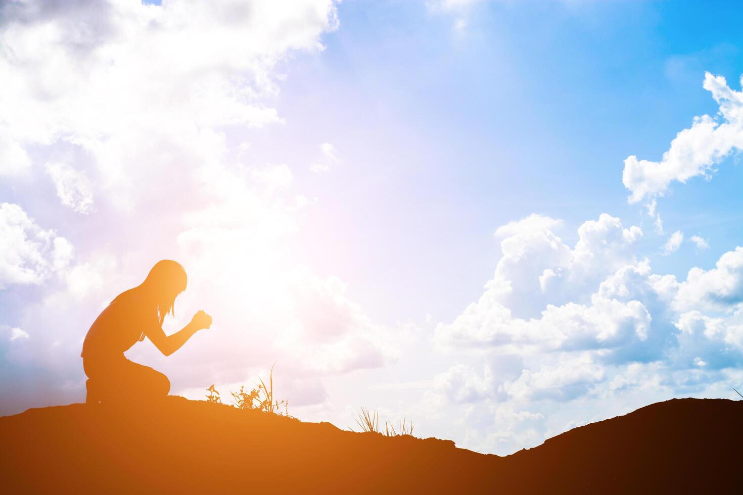 Sad woman sitting alone. photo