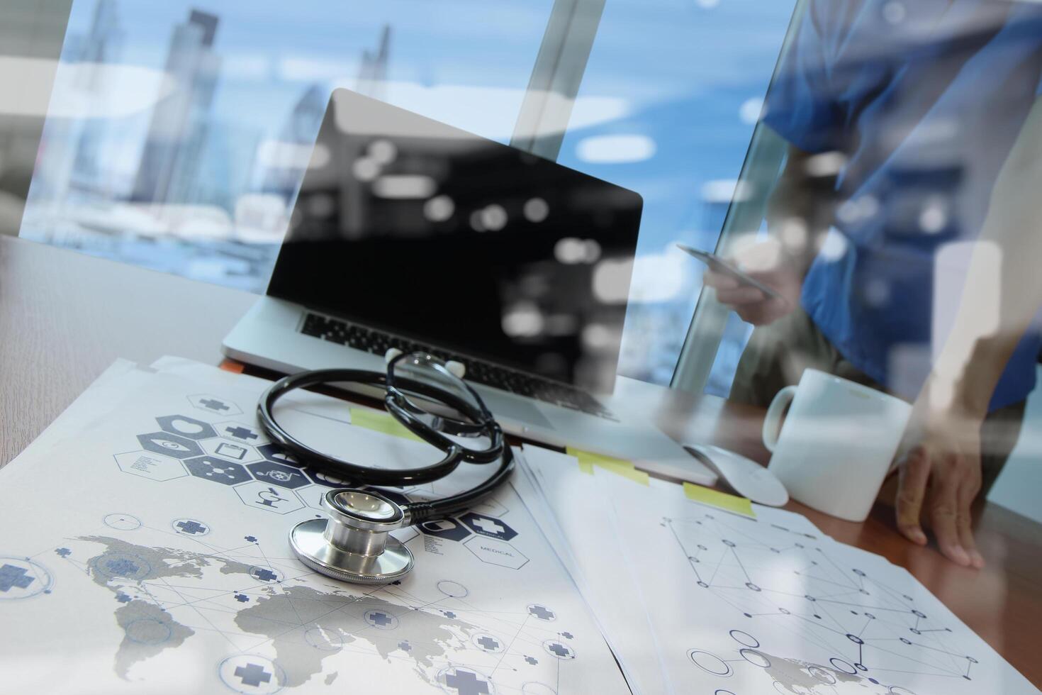 Doctor working with digital tablet and laptop computer in medical workspace office and medical network media diagram as concept photo