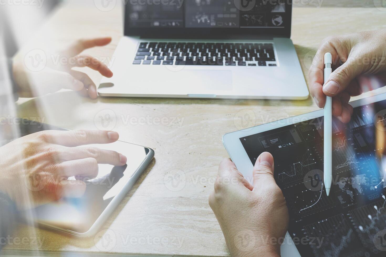 Businessman making presentation with his colleagues and business tablet ...