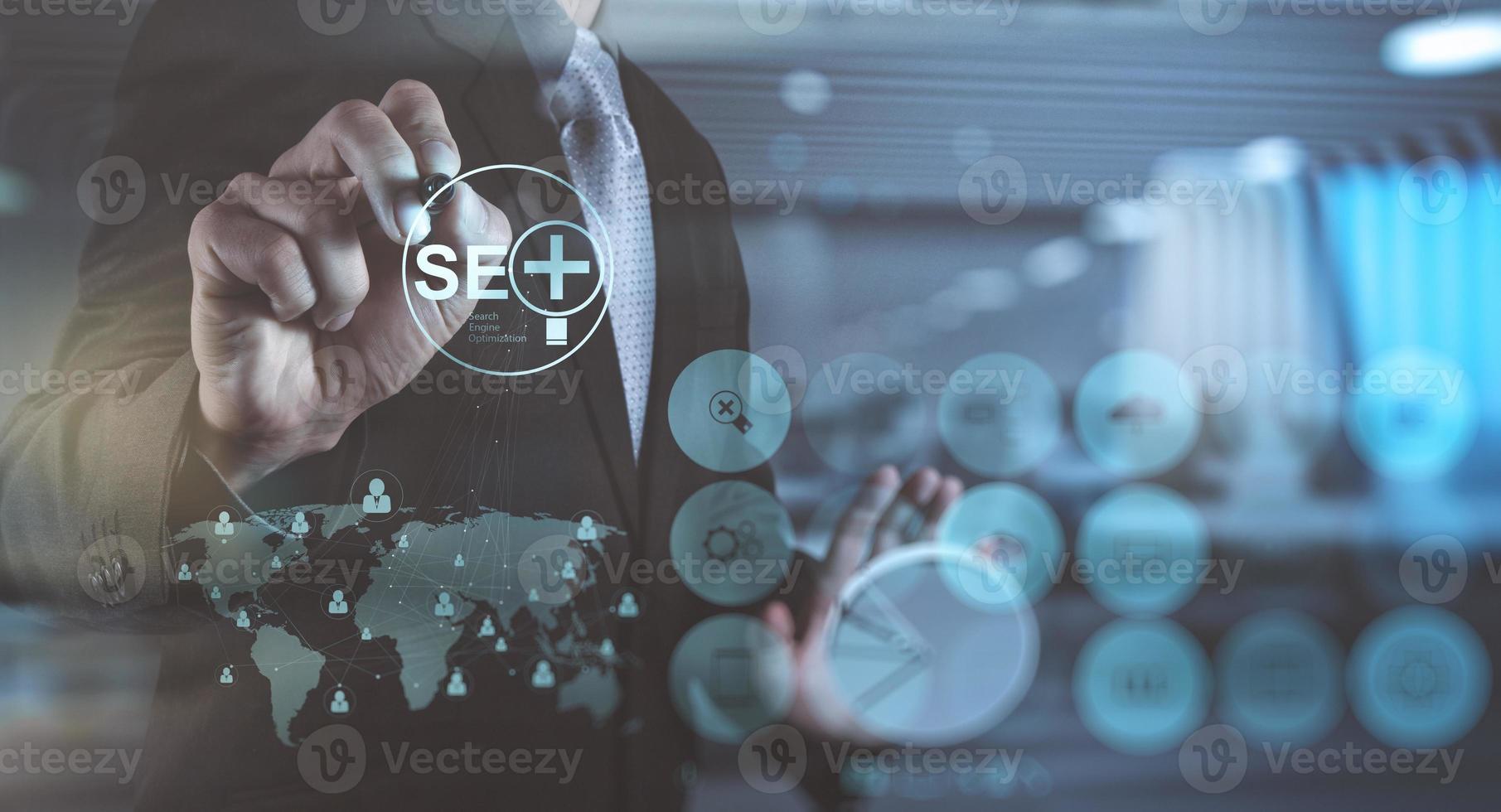 double exposure of  businessman hand showing search engine optimization SEO photo