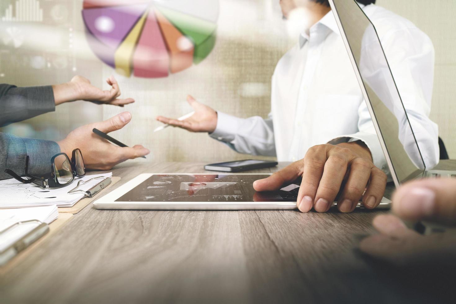 Businessman making presentation with his colleagues and business strategy digital layer effect at the office as concept photo