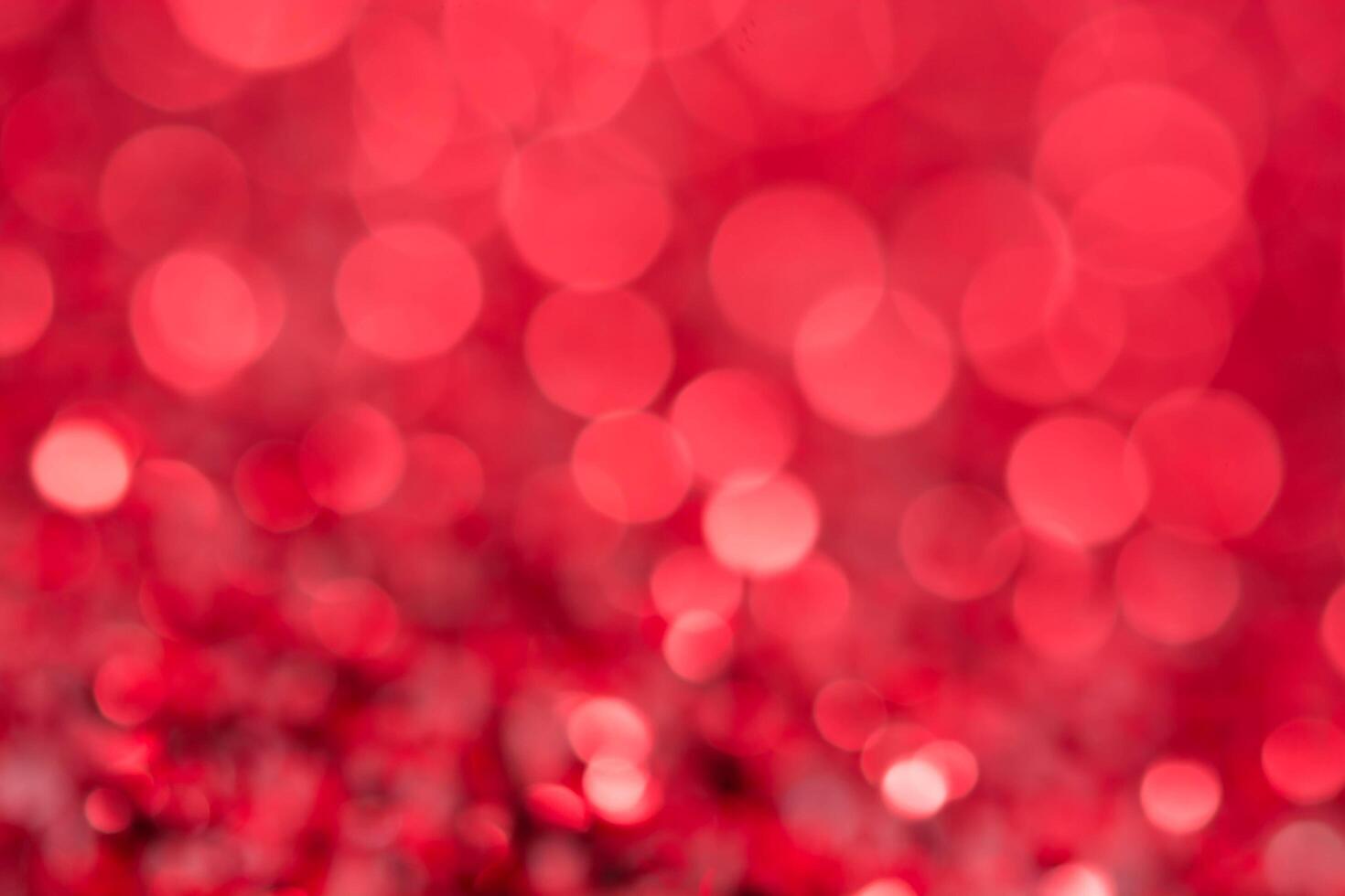 Red bokeh holiday textured Christmas decorations background photo