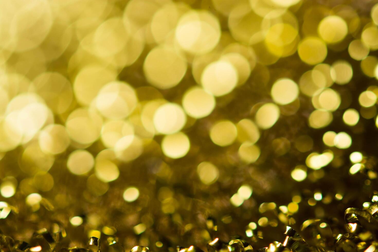 Gold spring or summer, Christmas Glittering background.Holiday abstract texture photo