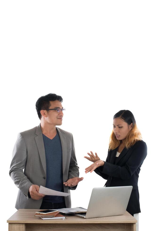 Young business woman standing with her boss conversation about the business at office isolated on white background. photo