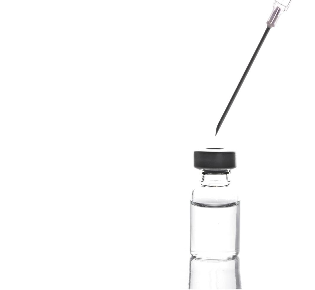 Syringe and vaccine isolated photo