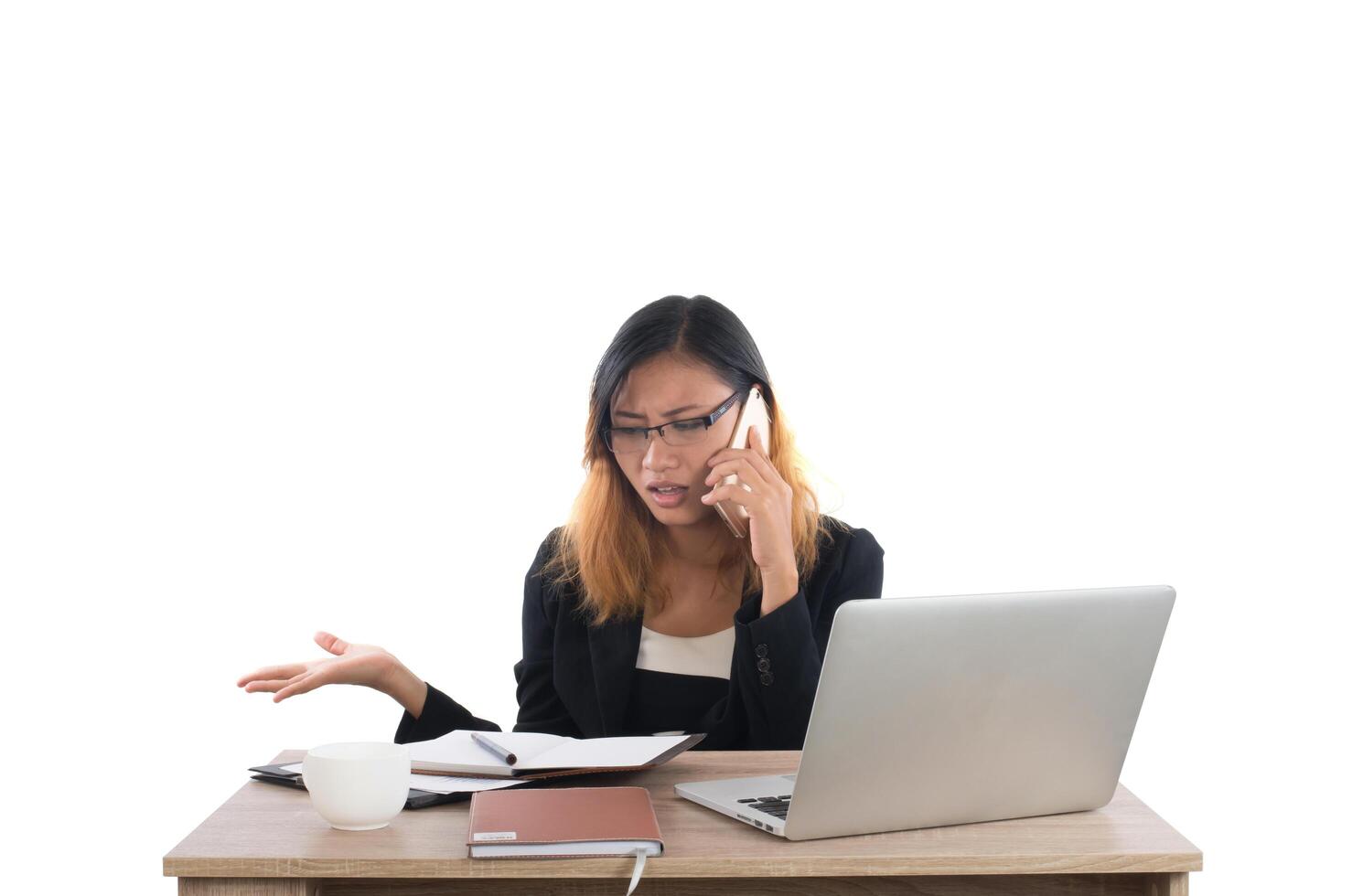 Businesswoman talking on phone while work at office isolated on white background. photo