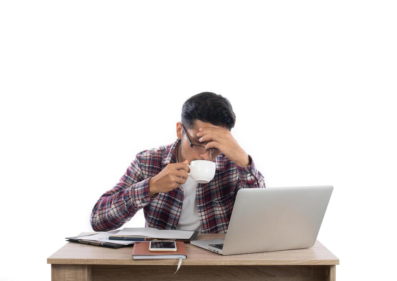 Worried businessman lamenting in front of a computer after got mistake at office. photo