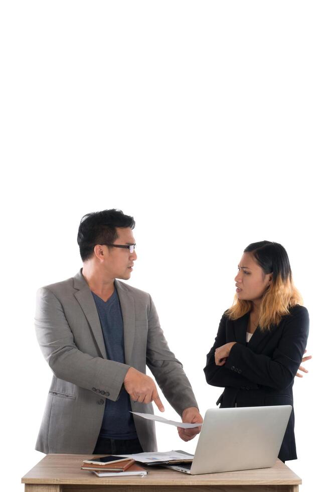 Young business woman standing with her boss conversation about the business at office isolated on white background. photo