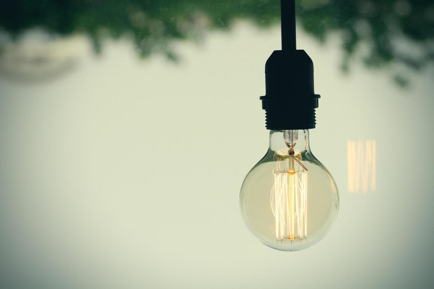 close up of vintage light bulb as creative concept photo