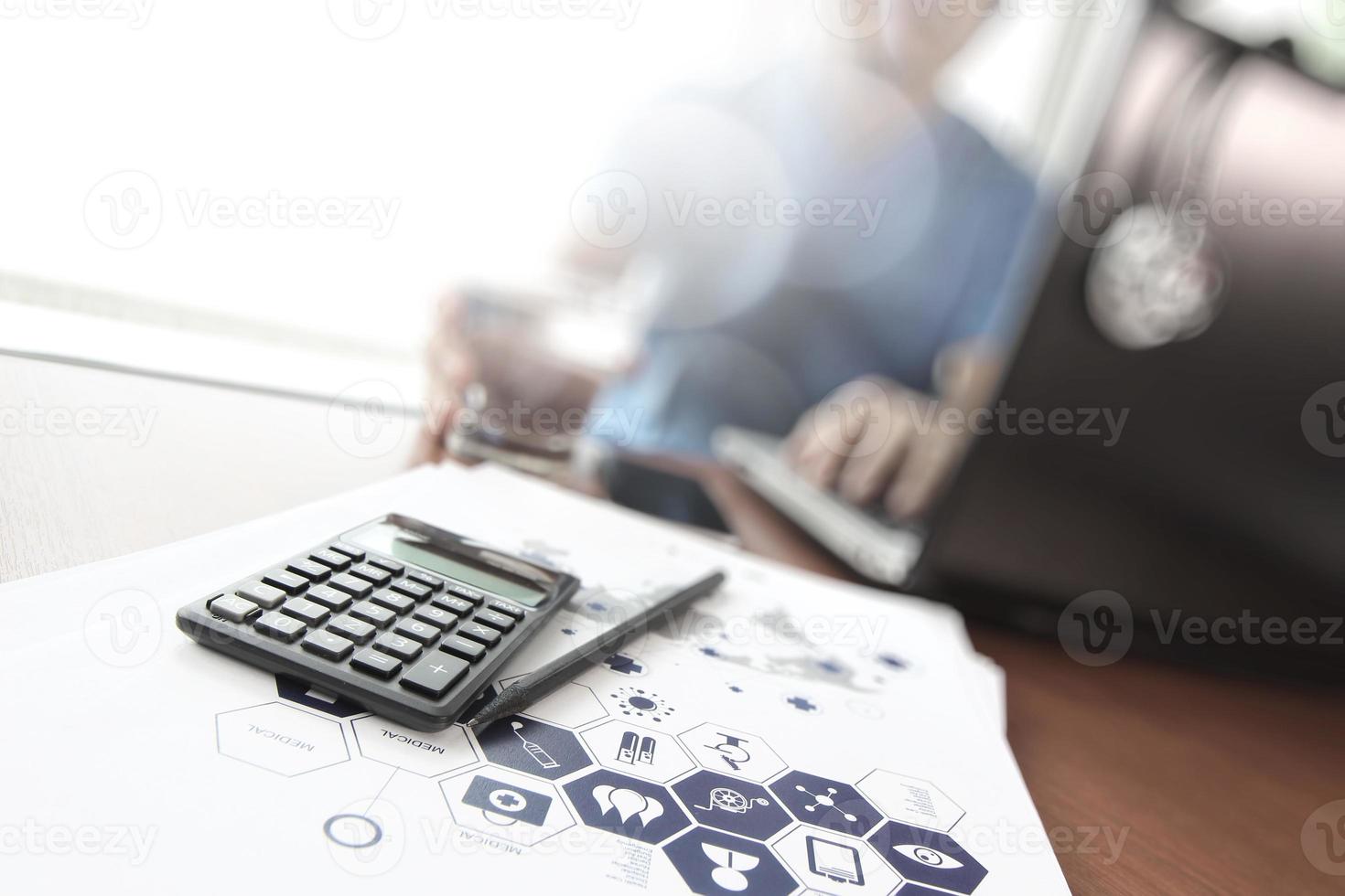 Doctor working with  laptop computer in medical workspace office and medical network media diagram as concept photo