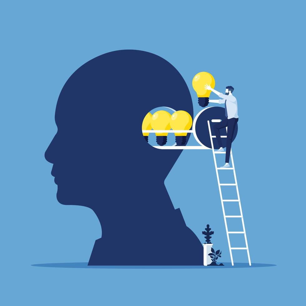 businessman insert light bulb of idea to human head, business ...