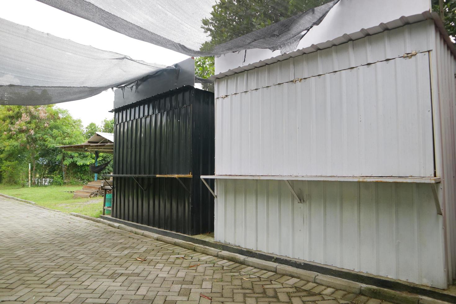 two black and white stall containers photo