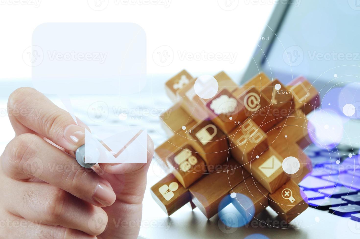 businessman hand use interactive computer with virtual email icon as concept photo