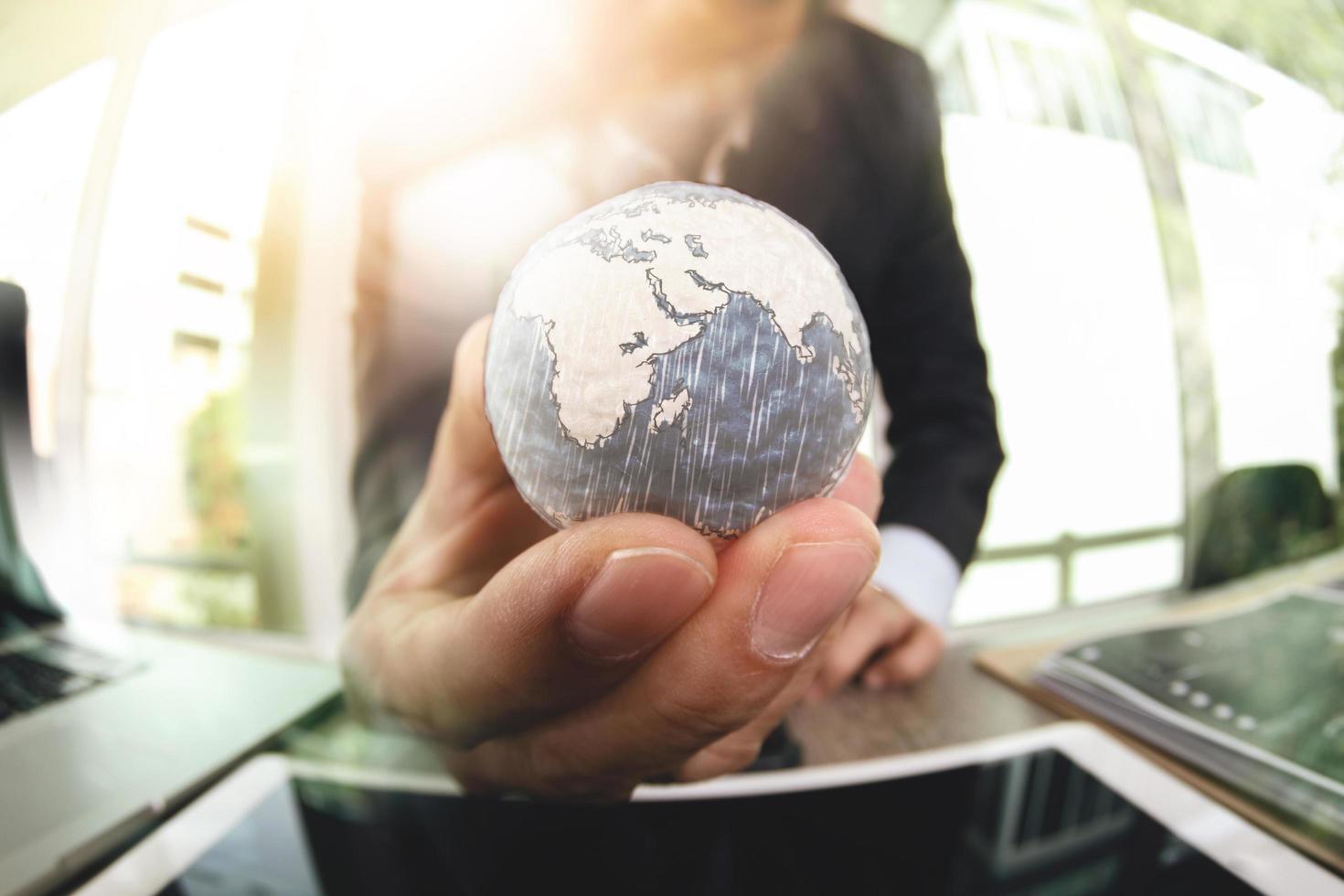 close up of businessman hand showing texture the world concept Elements of this image furnished by NASA photo