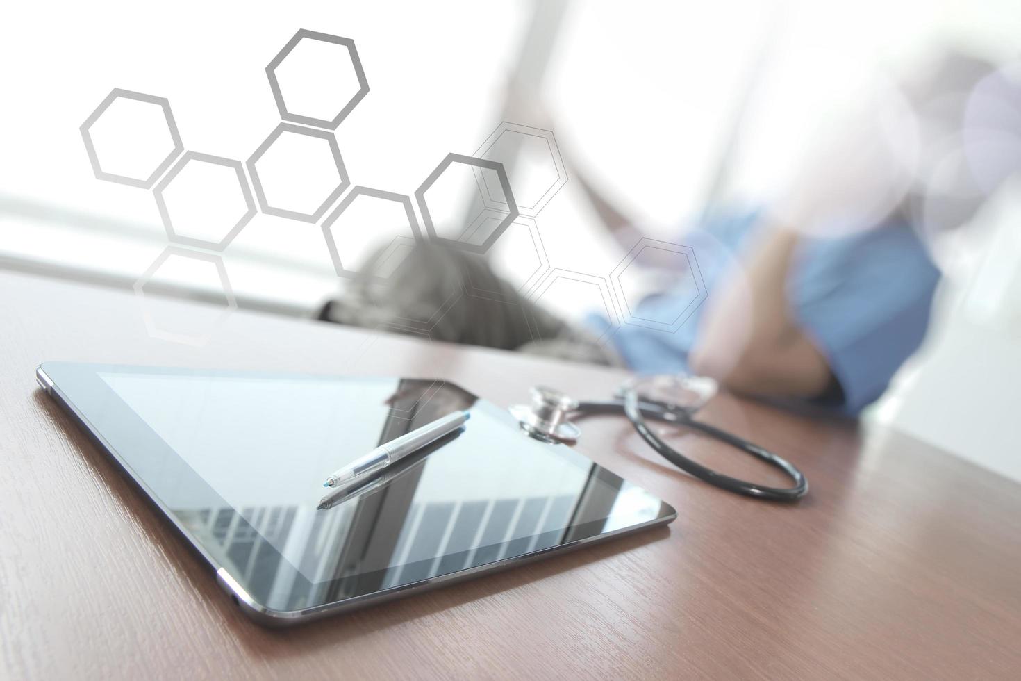 Doctor working with digital tabletr in medical workspace office as concept photo