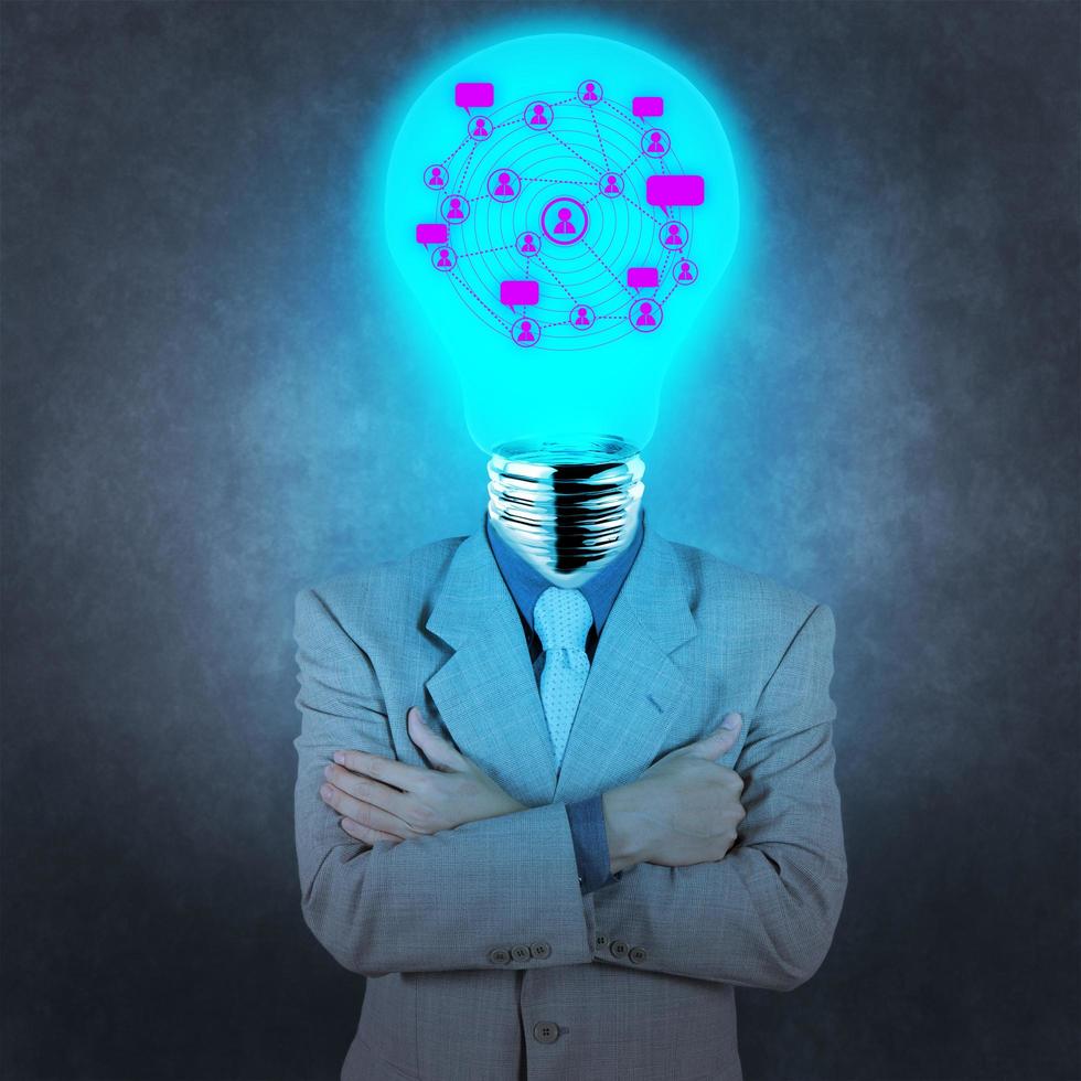 businessman with lamp-head as social network concept photo