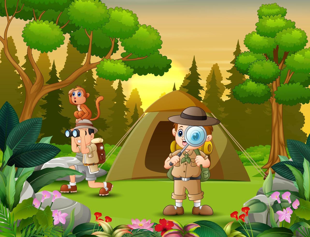 los niños exploradores acampando en la naturaleza vector