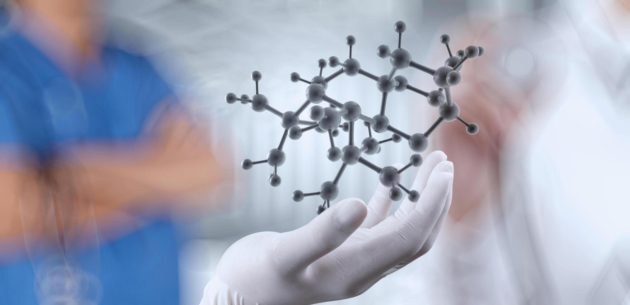 scientist doctor hand holds virtual molecular structure in the lab as concept photo