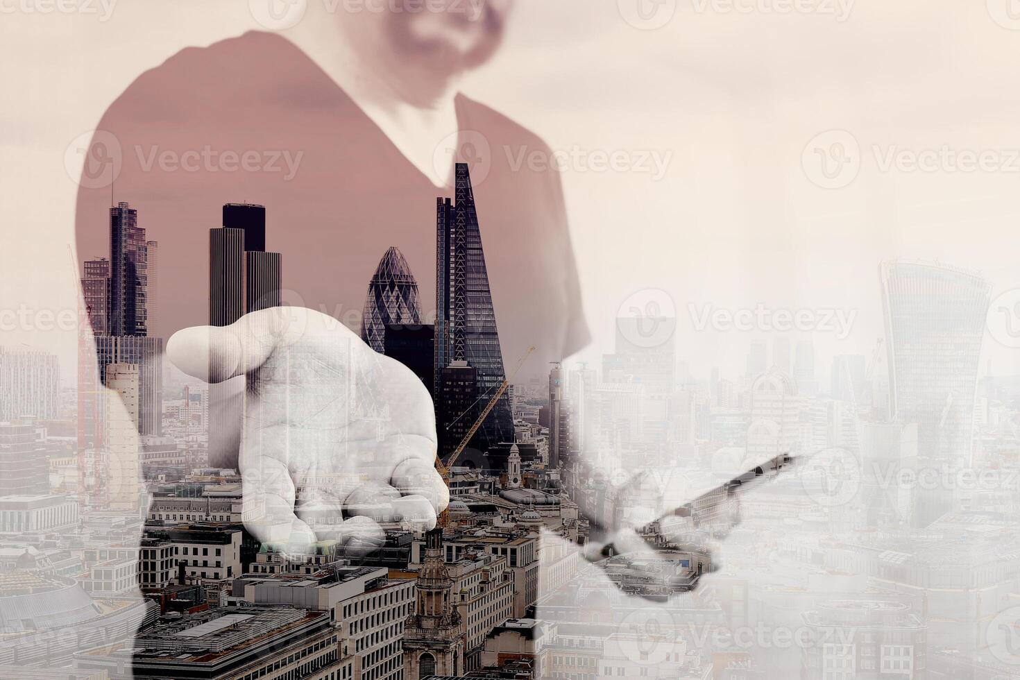 Double exposure of Designer hand pressing an imaginary button,holding smart phone,digital screen graphic virtual icons,channel,diagram,London architecture photo