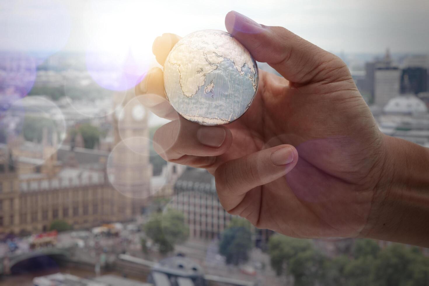 close up of businessman hand showing texture the world with digital social media network diagram concept Elements of this image furnished by NASA london city background photo