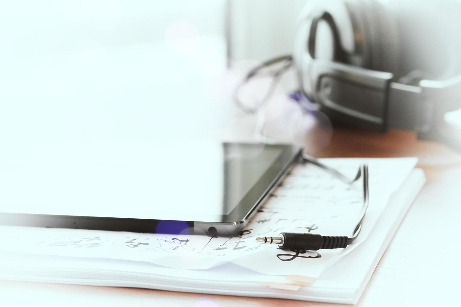 composing music concept with shallow DOF evenly matched jack of headphone and copy space photo