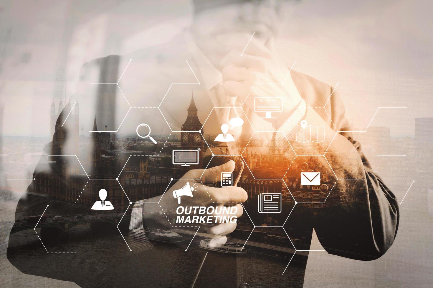 Double exposure of success businessman holding digital tablet computer with London building,city,river,Bigben,front view,filter effect photo