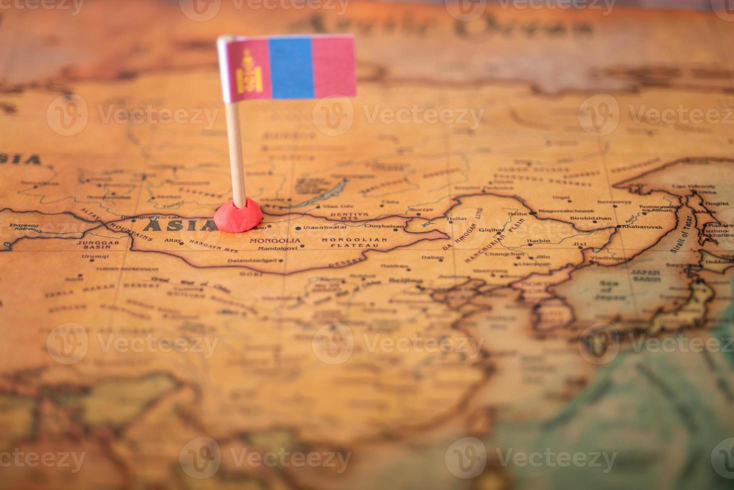 Flag of Mongolia on the world map. photo