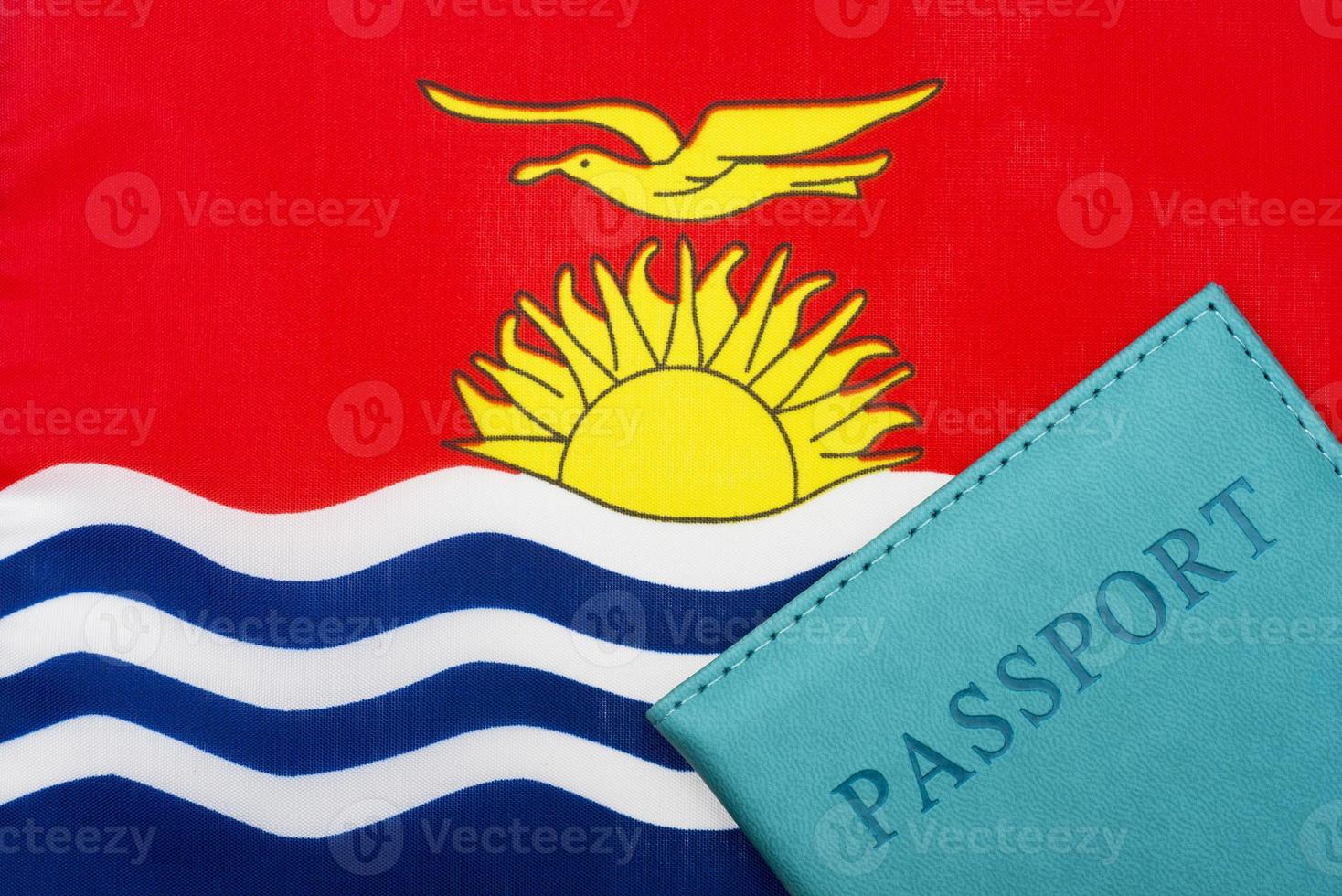 Against the background of the Kiribati flag is a passport. photo