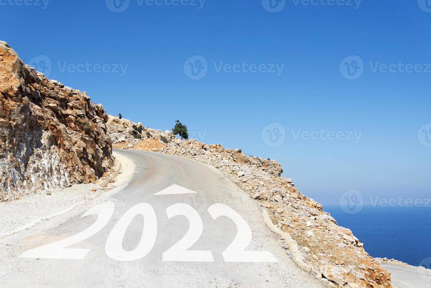 Rural road on a Sunny summer day near the water photo