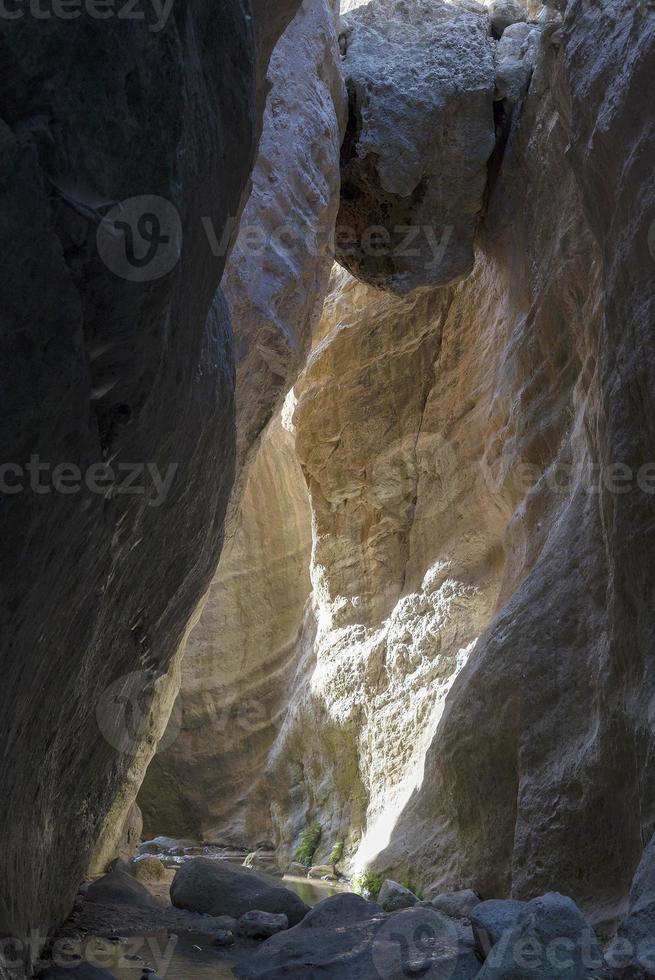 Sunlit multicolored rocks of Avakas Gorge in Cyprus. photo