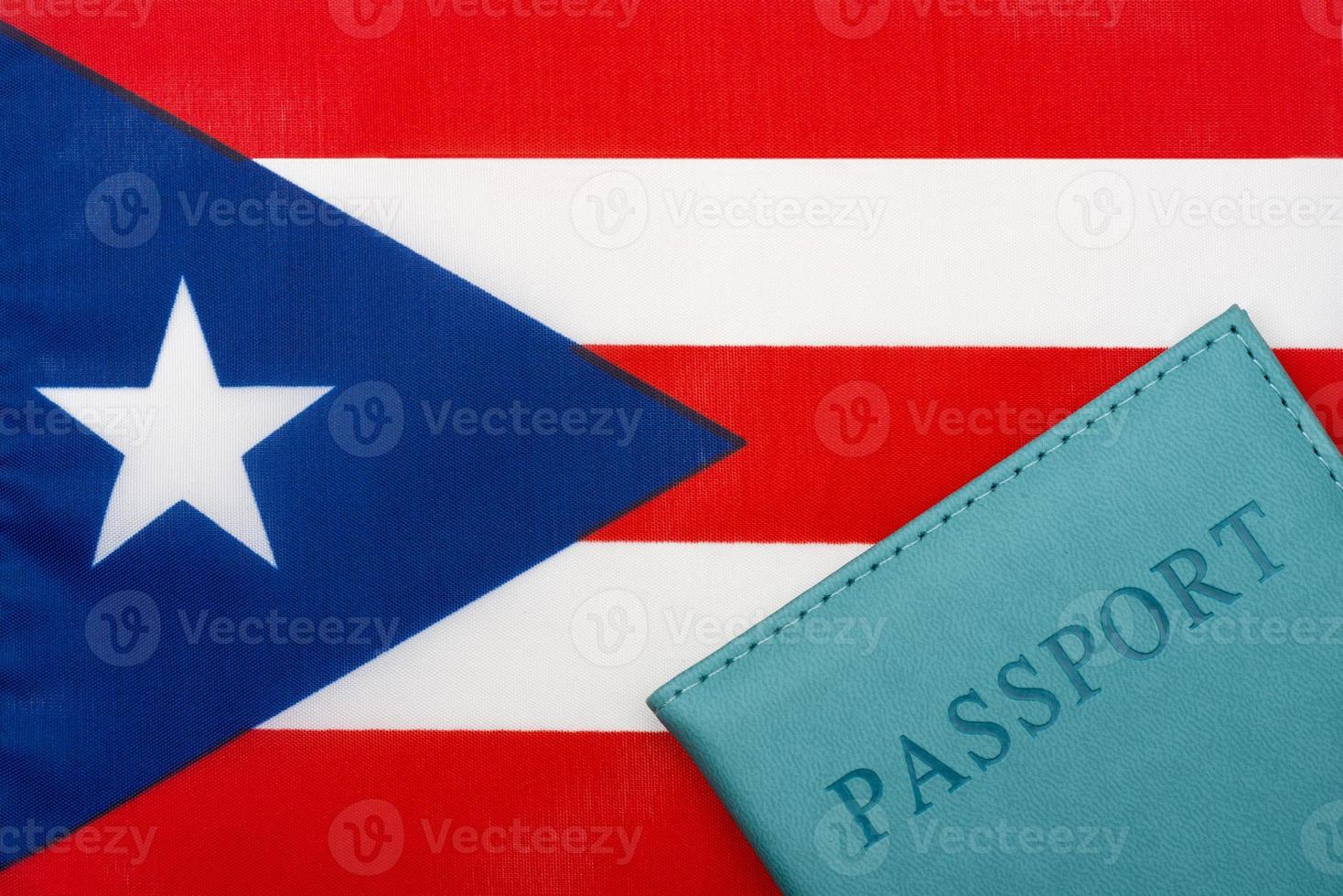 On the background of the flag of Puerto Rico is a passport. photo