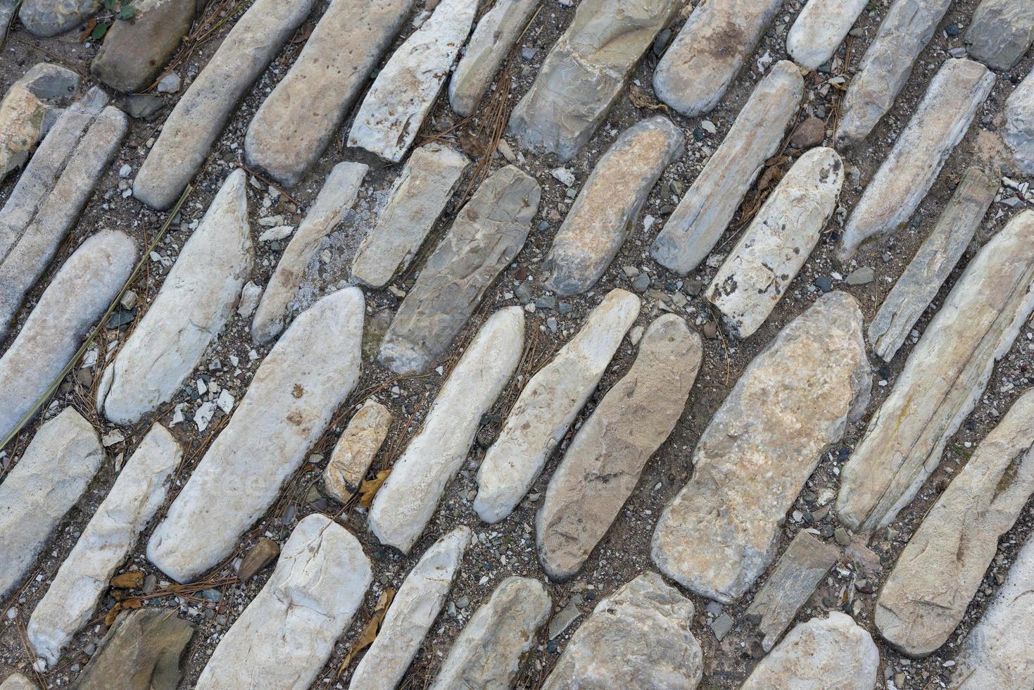 Multicolored stones on the ground. Different shapes and sizes 5326843