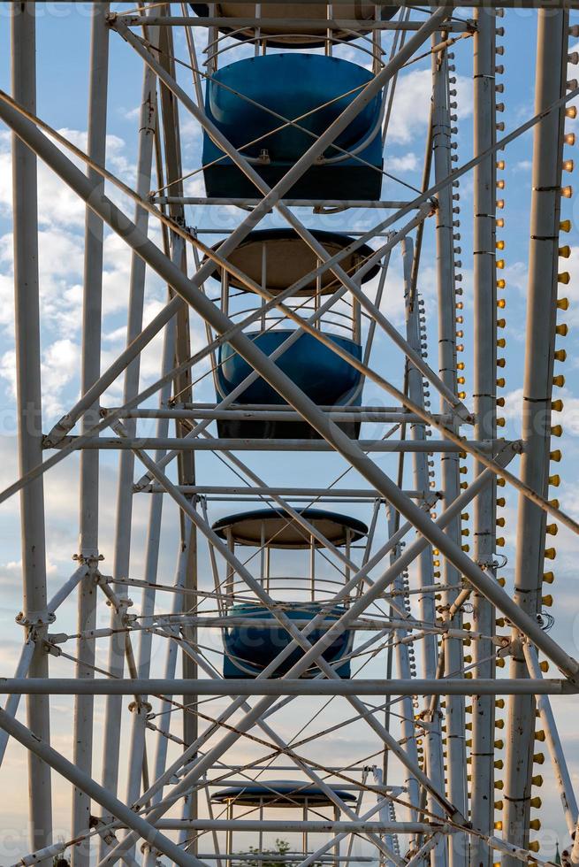 View of Inside of Ferris Wheel view of the structure with cabins. photo