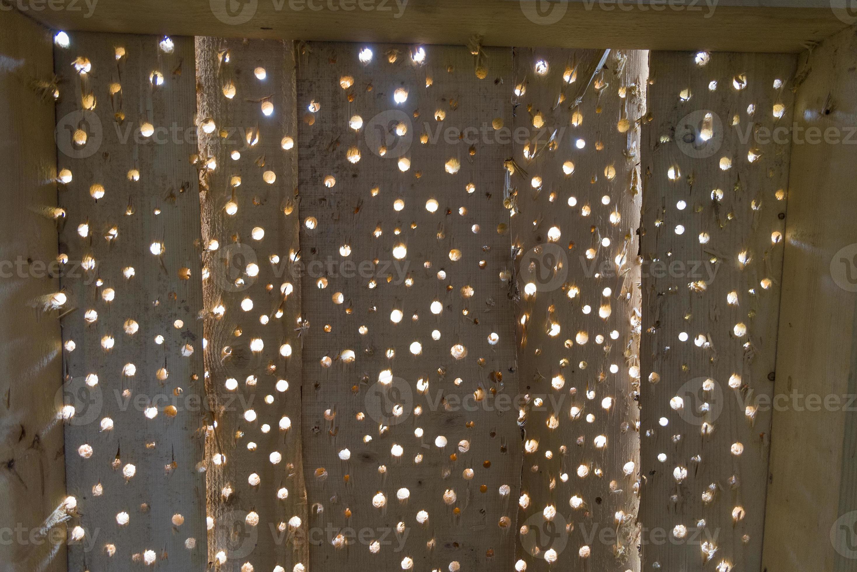 Holes in wood Board, wood Board background. 5326944 Stock Photo at Vecteezy