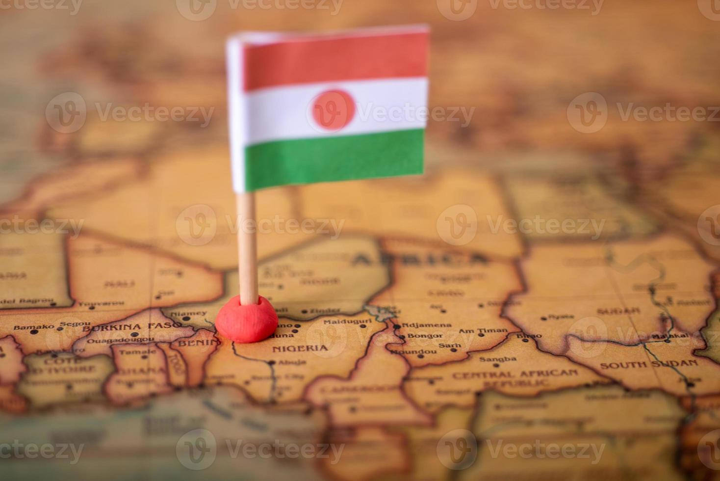the flag of Niger on the world map. photo