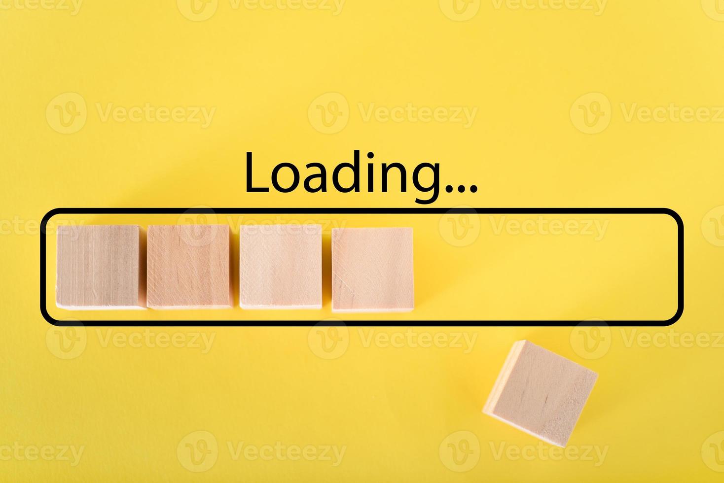 Loading the progress bar with wooden cubes. Download progress. Loading status photo