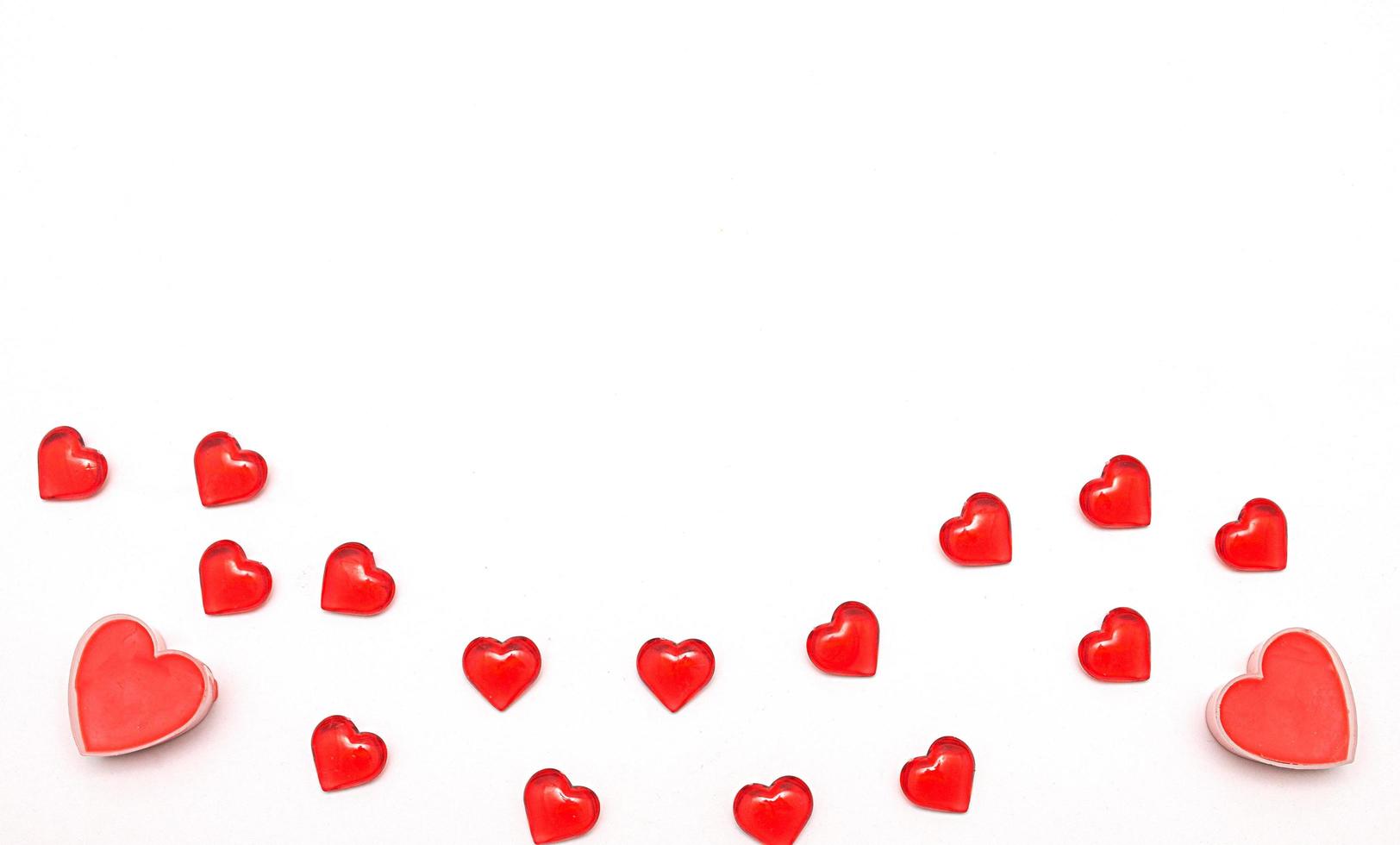 Valentine day background.Several romantic valentine hearts on white background photo