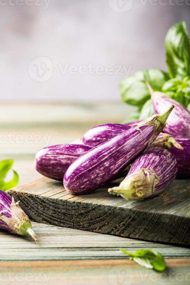 Heap of small eggplant or aubergine photo