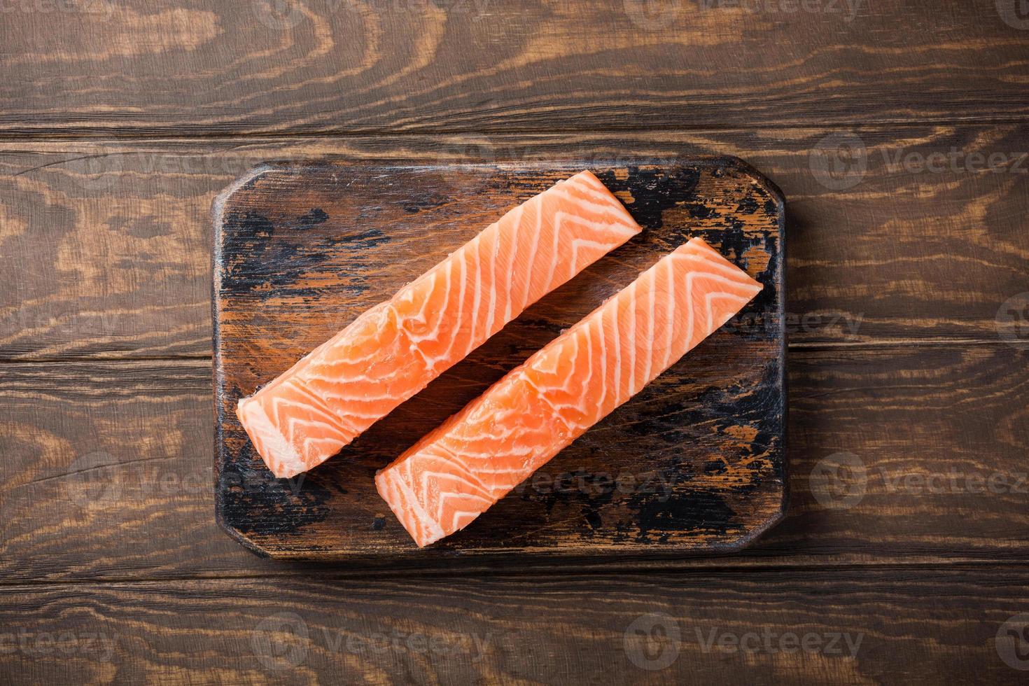 Fresh raw salmon fillet, flat lay photo