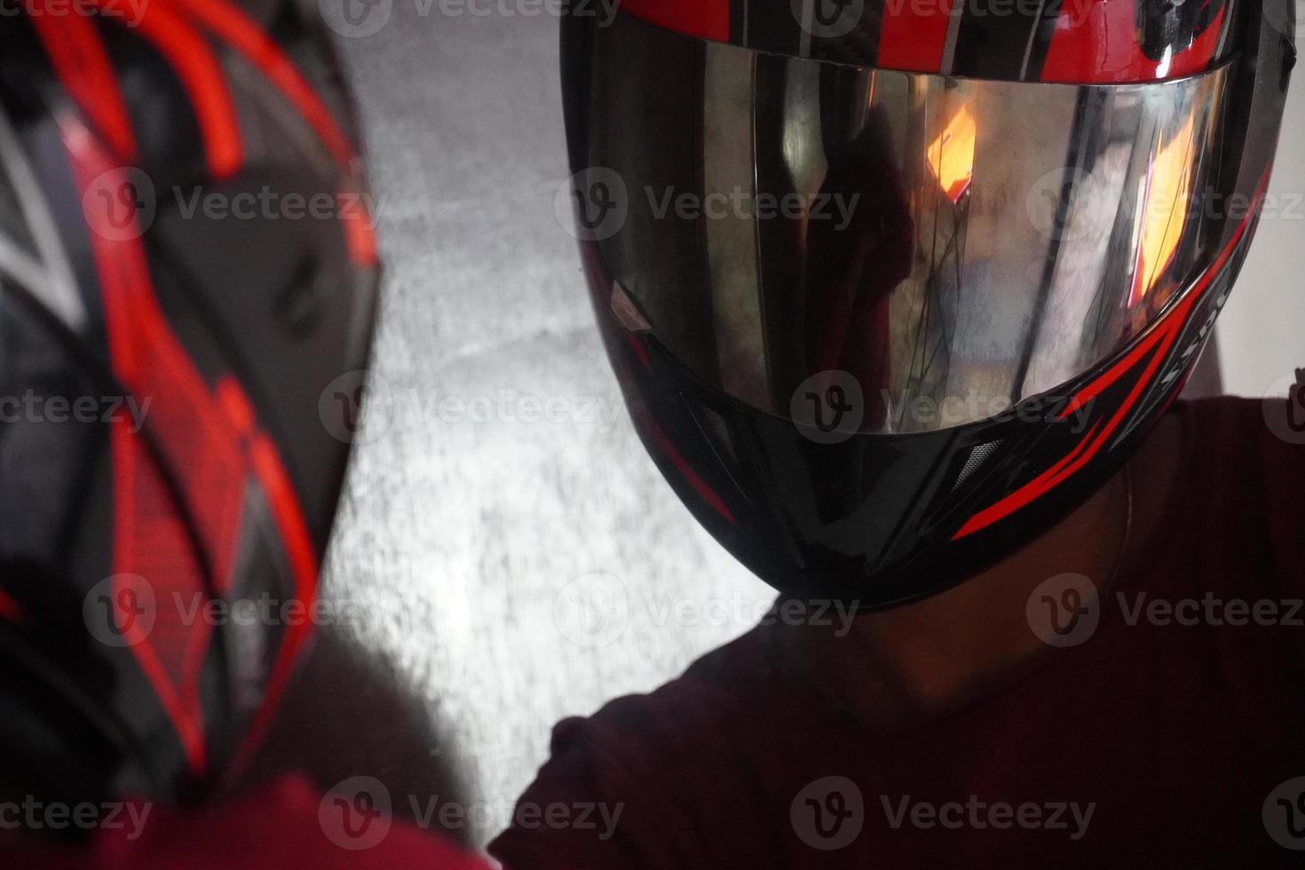 man with bike helmet and happy in mirror image photo