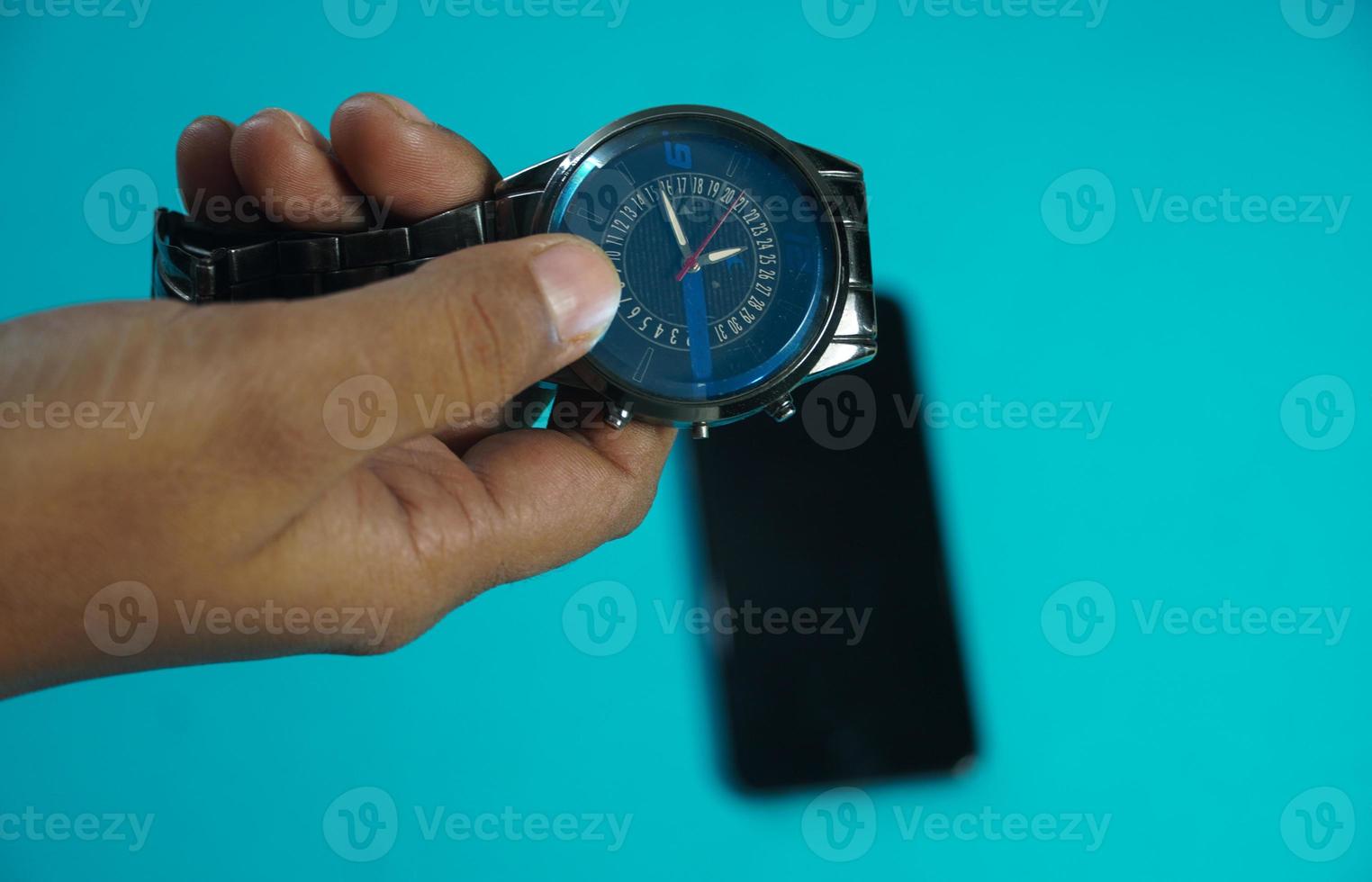 mobile and watch isolated background - time waste using mobile concept photo