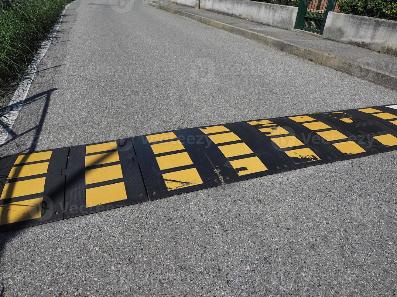 speed bump hump sign photo