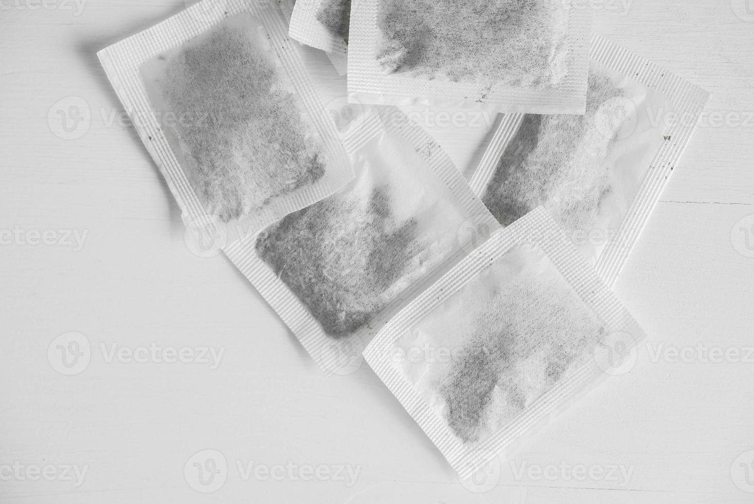Group of square dry tea bags on a white background. Top view. Copy, empty space for text photo