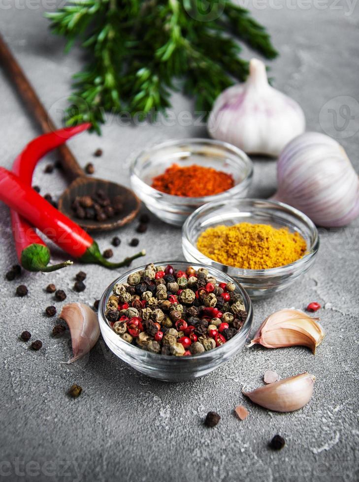 Different kind of spices in bowls photo