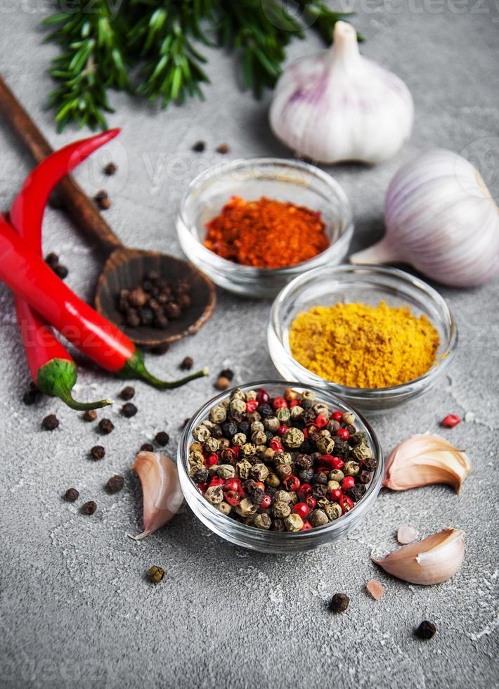 Different kind of spices in bowls photo