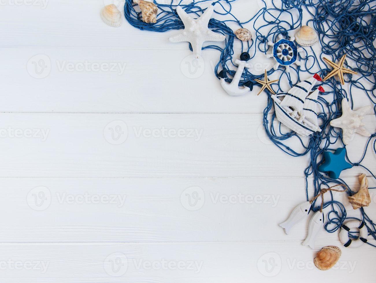 Fishing net with starfish and sea decorations photo