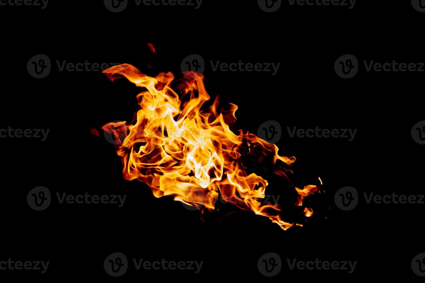 Fire flame texture. Burning material backdrop. Burn effect pattern. Blaze and torch wallpaper. Heat and haze backdrop. photo