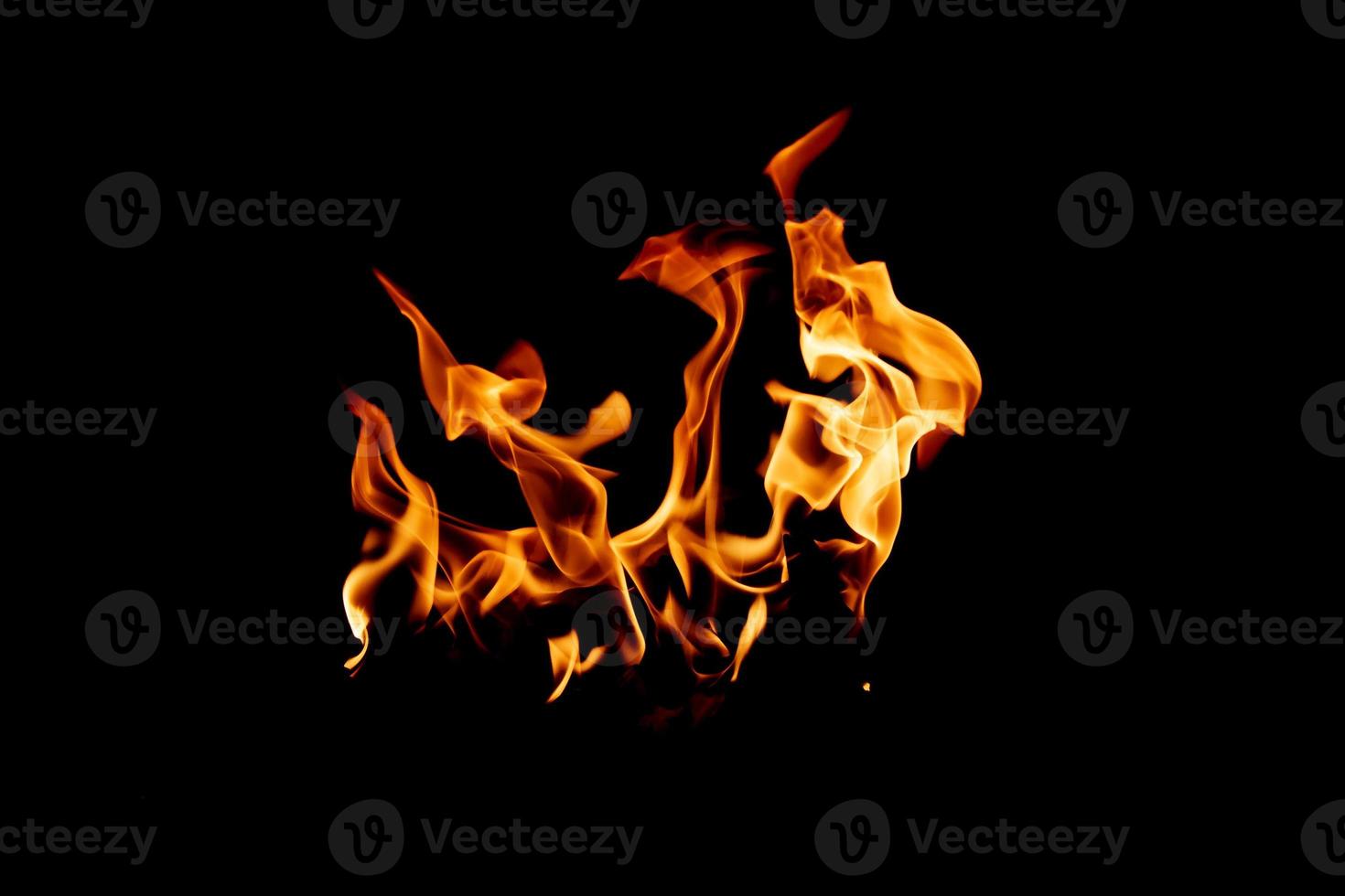 Fire flame texture. Burning material backdrop. Burn effect pattern. Blaze and torch wallpaper. Heat and haze backdrop. photo